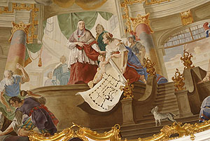 Schloss Bruchsal, Deckenfresko im Kuppelsaal: Kardinal Schönborn mit einem Plan des Schlosses. Foto: kulturer.be