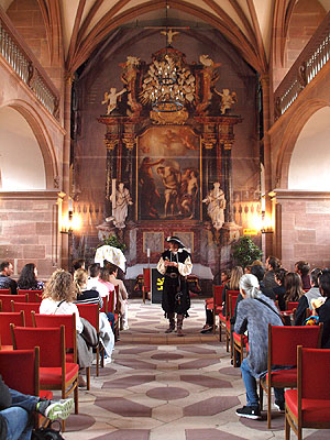 Kurzeinführung durch den kurfürstlichen Feldprediger Johann Elias Hügeler (*1549) in der Schlosskapelle. Foto: Jessca Mallach, kulturer.be