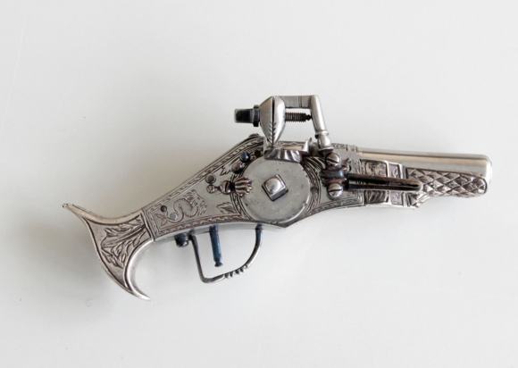 Miniaturisierte Radschlosspistole. Abb. WGM